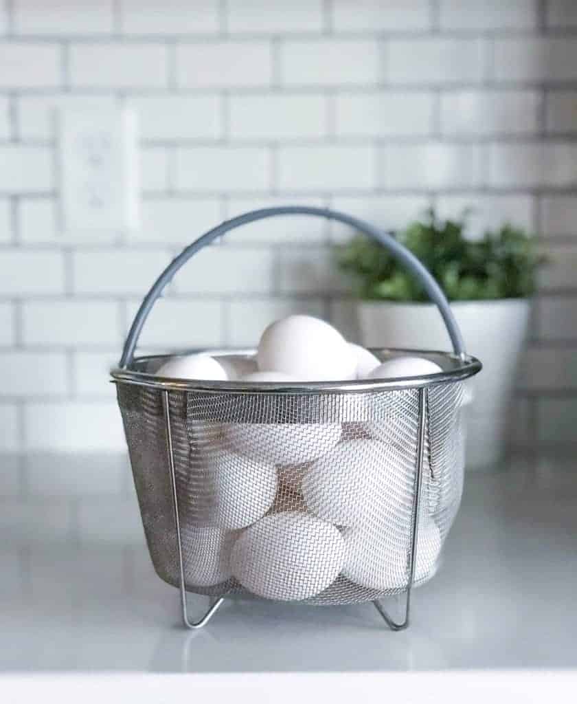 Hard boiled eggs in a steamer basket for Instant Pot, one of the best accessories for pressure cooking