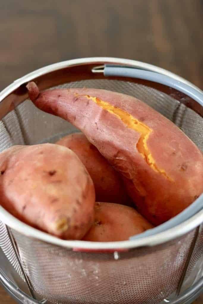Instant Pot Sweet Potatoes in steamer basket