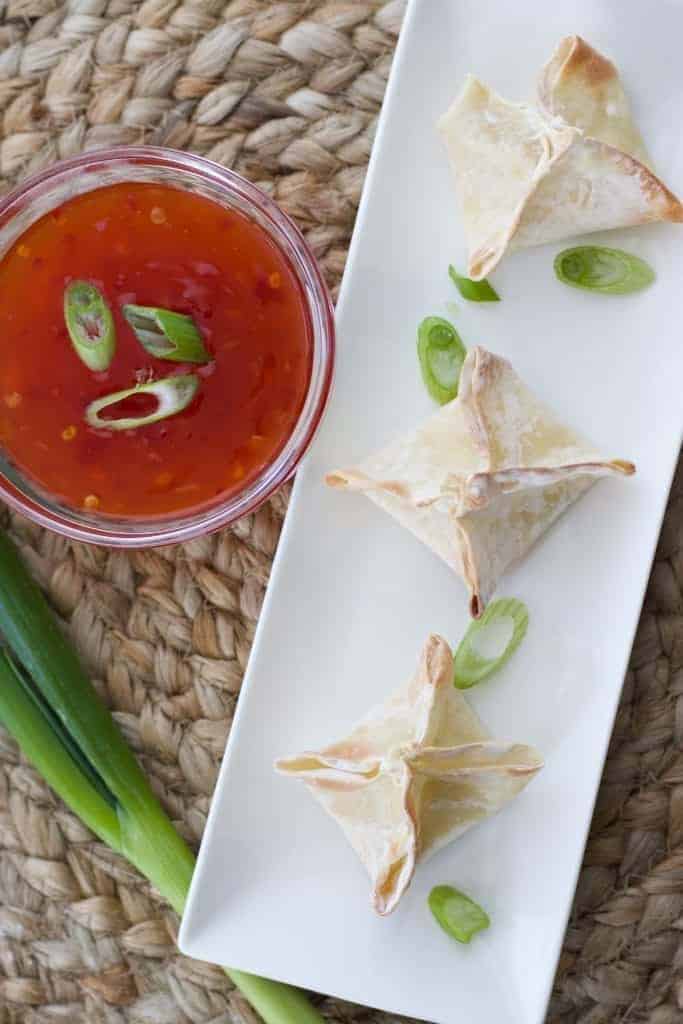 Cream cheese wontons with green onions and dipping sauce