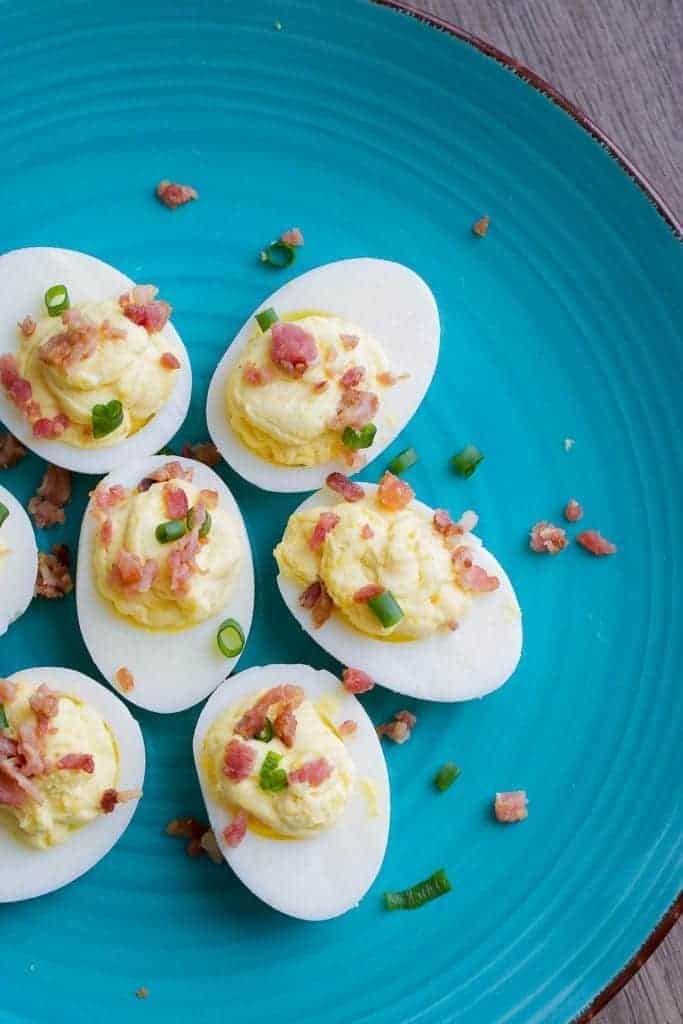 Bacon Chive Deviled Eggs made in the Instant Pot or pressure cooker for Easter! Top 10 tips for the best deviled eggs. Whipped cream recipe. Great way to use leftover cream in whipped cream deviled eggs. Instant Pot hard boiled eggs #eggs #easter #appetizer | Tried Tested and True Instant Pot Cooking by Lisa Childs