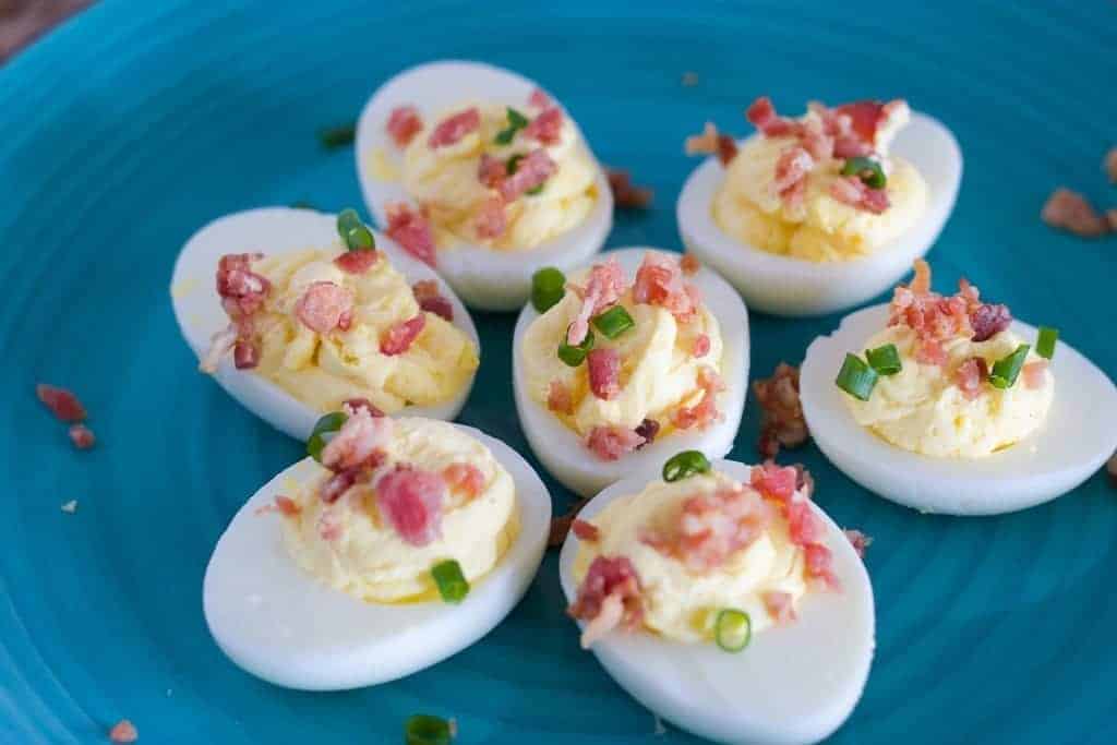 Bacon Chive Deviled Eggs made in the Instant Pot or pressure cooker for Easter! Top 10 tips for the best deviled eggs. Whipped cream recipe. Great way to use leftover cream in whipped cream deviled eggs. Instant Pot hard boiled eggs #eggs #easter #appetizer | Tried Tested and True Instant Pot Cooking by Lisa Childs