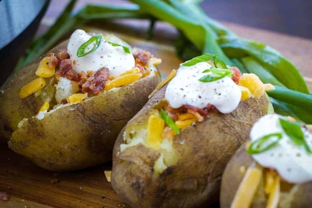 baked potatoes with toppings