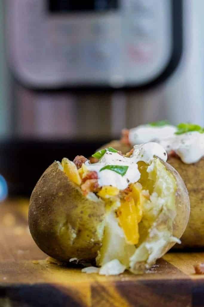 a baked potato with an Instant Pot in the background