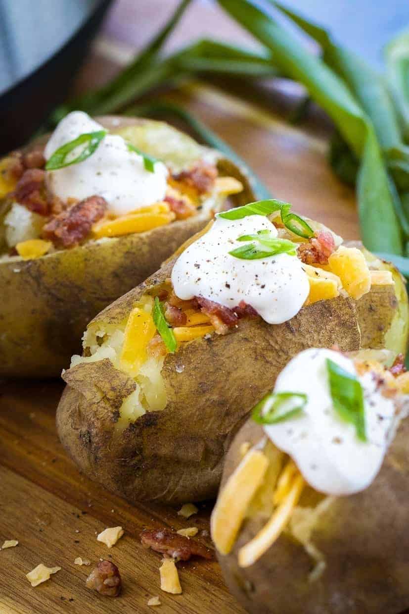 three Instant Pot baked potatoes in a row