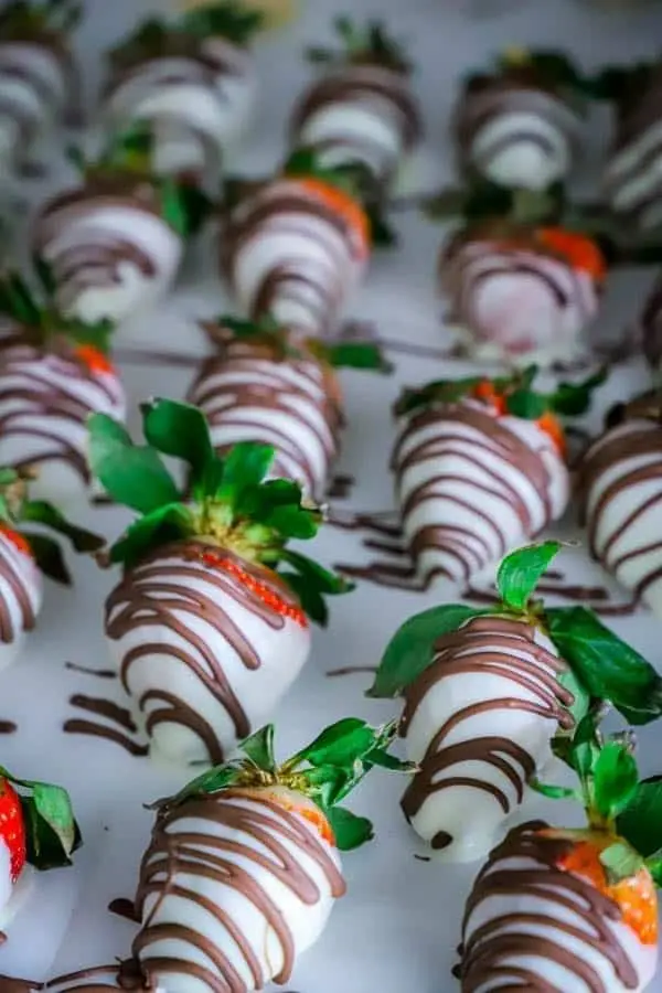 a tray of chocolate covered strawberries