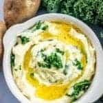 A BLUE DISH with colcannon potatoes, kale, and potatoes