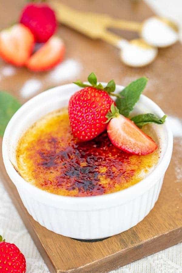 creme brulee with strawberries and mint