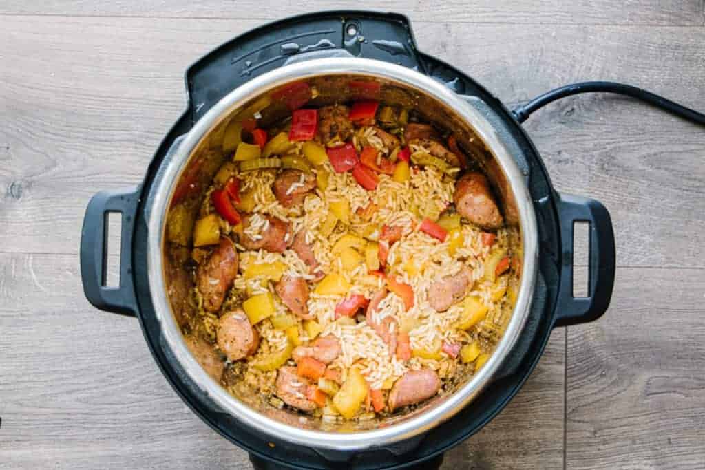 cajun sausage, veggies, and rice mixed in an Instant Pot 