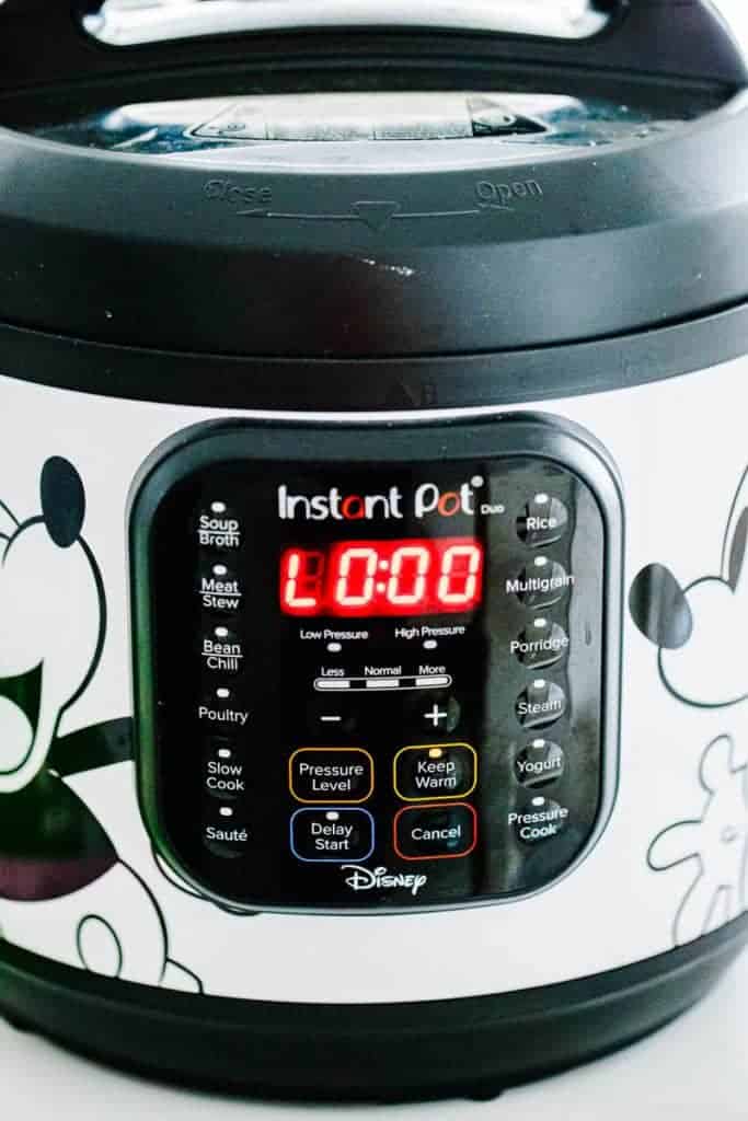 mickey mouse black and white instant pot with timer at zero