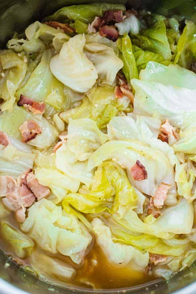 top view of cooked cabbage and bacon in instant pot