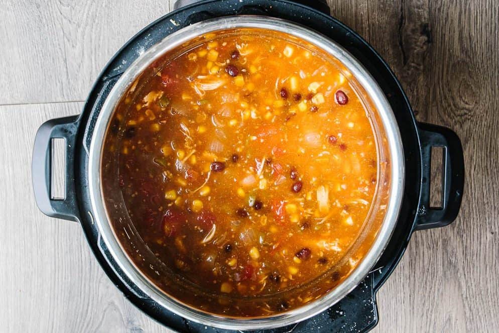 top view of enchilada soup in instant pot