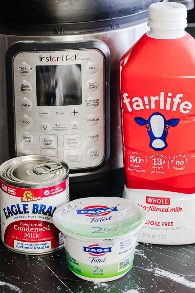 photo of instant pot yogurt ingredients: instant pot, fairlife milk, sweetened condense milk, fage 2%