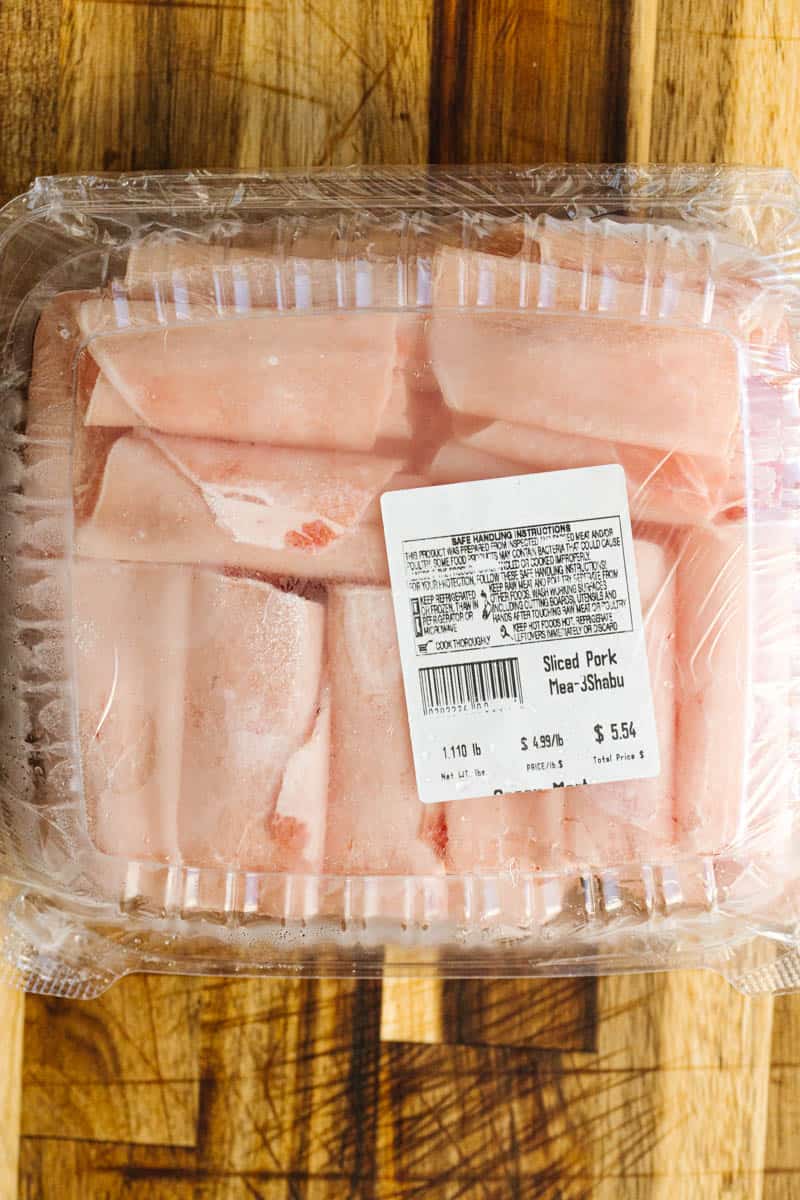 sliced pork in packaged container